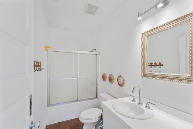 bathroom with toilet, visible vents, bath / shower combo with glass door, and vanity