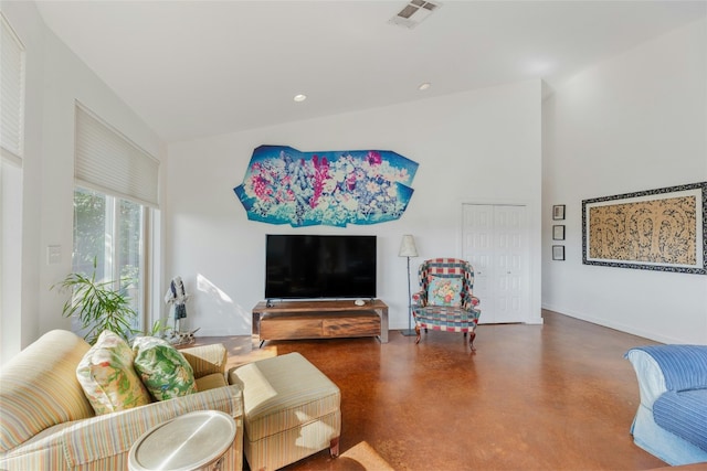 living room with concrete flooring, high vaulted ceiling, visible vents, and recessed lighting