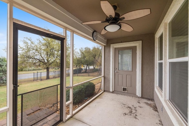839 Salado Creek Ln, Georgetown, TX 78633 - unfurnished sunroom with a water view and ceiling fan