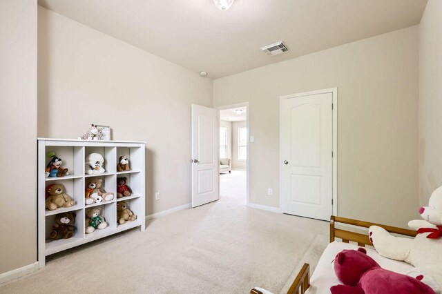 2920 Agave Loop, Round Rock, TX 78681 - carpeted bedroom with baseboards