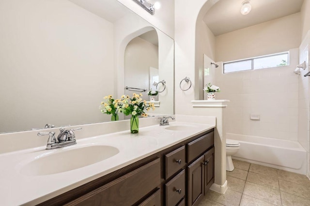 2920 Agave Loop, Round Rock, TX 78681 - bathroom featuring double vanity, tub / shower combination, and tile patterned floors