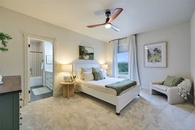 1174 Royal Eagle Dr, Fischer, TX 78623 - bedroom with light carpet, connected bathroom, and a ceiling fan