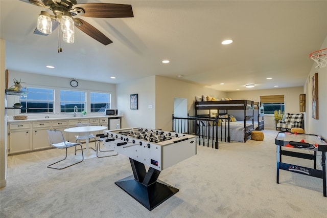 1174 Royal Eagle Dr, Fischer, TX 78623 - game room featuring light colored carpet, ceiling fan, recessed lighting, and a sink