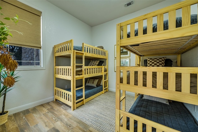 1174 Royal Eagle Dr, Fischer, TX 78623 - bedroom featuring wood finished floors and baseboards
