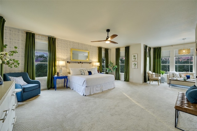 1174 Royal Eagle Dr, Fischer, TX 78623 - bedroom with multiple windows, carpet flooring, and a ceiling fan