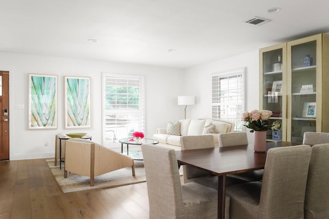 2517 Exposition Blvd, Austin, TX 78703 - dining area featuring plenty of natural light, light wood finished floors, baseboards, and recessed lighting