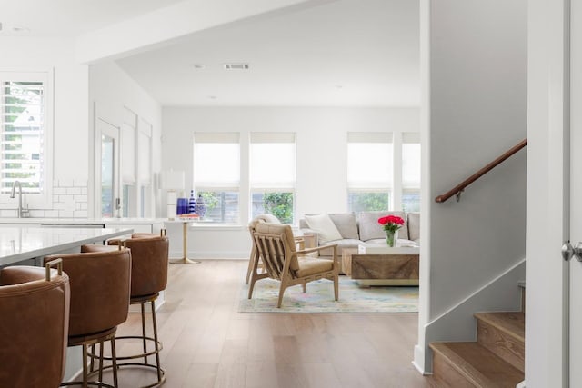 2517 Exposition Blvd, Austin, TX 78703 - living room featuring stairs and light wood-type flooring