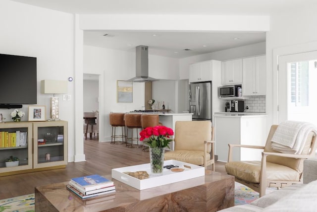 2517 Exposition Blvd, Austin, TX 78703 - living room featuring wood finished floors, recessed lighting, and baseboards