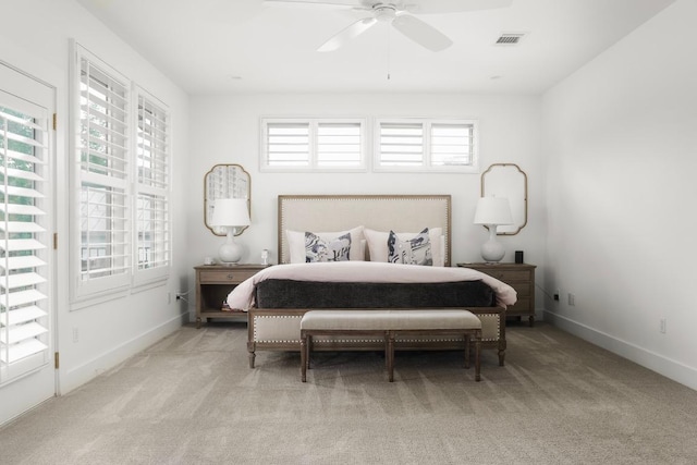 2517 Exposition Blvd, Austin, TX 78703 - bedroom featuring multiple windows, carpet floors, and baseboards