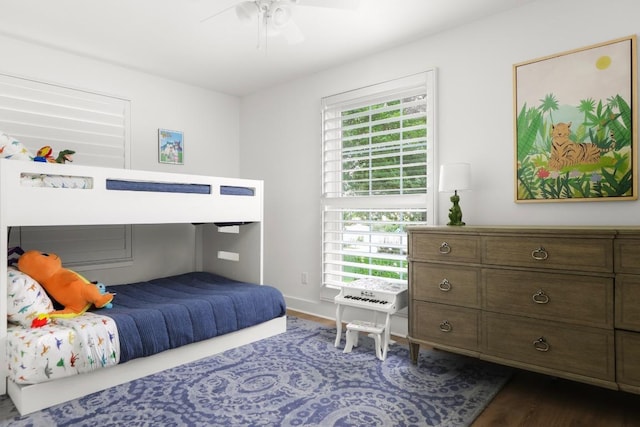 2517 Exposition Blvd, Austin, TX 78703 - bedroom featuring dark wood-style floors, ceiling fan, and baseboards