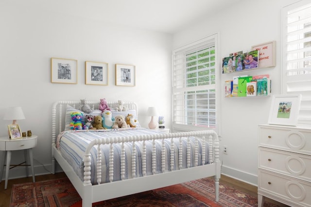 2517 Exposition Blvd, Austin, TX 78703 - bedroom with wood finished floors and baseboards