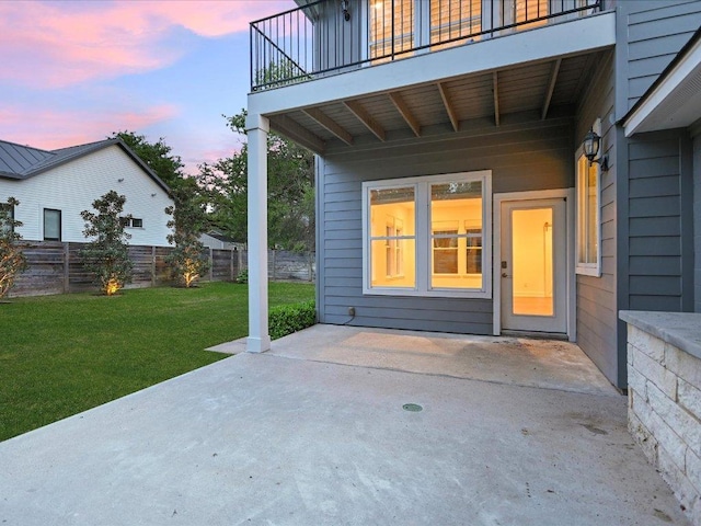 2517 Exposition Blvd, Austin, TX 78703 - patio terrace at dusk featuring a balcony and a patio area