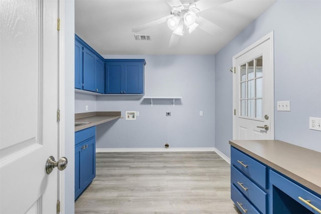 washroom featuring washer hookup, light wood-type flooring, hookup for an electric dryer, visible vents, and cabinet space