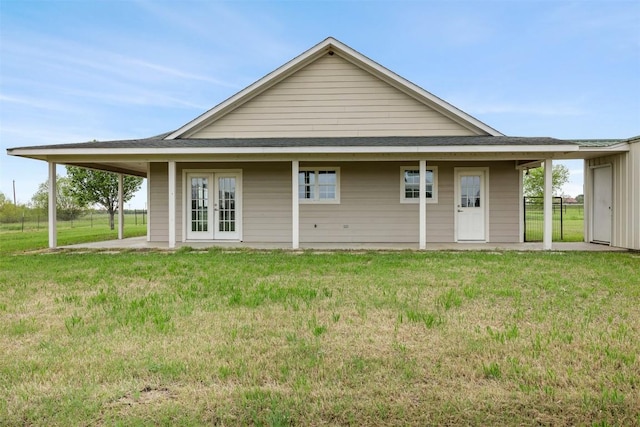 1234 County Road 135, Lincoln, TX 78948 - rear view of property with a yard and french doors