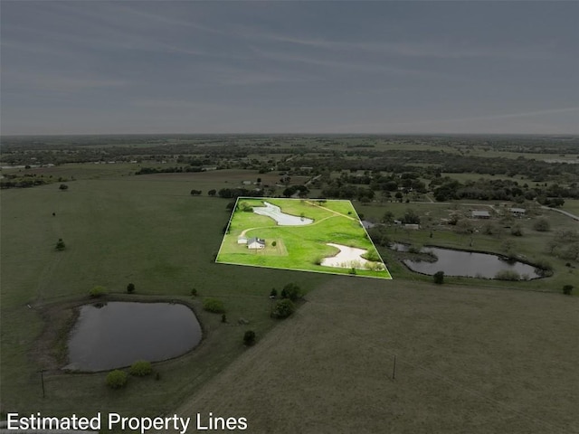 aerial view featuring a water view and a rural view