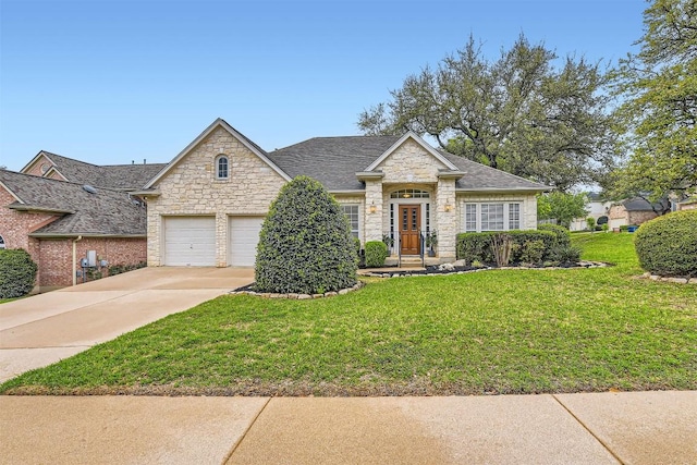 11100 Comiso Pala Path, Austin, TX 78726 - traditional home with stone siding, driveway, a front lawn, an attached garage, and roof with shingles