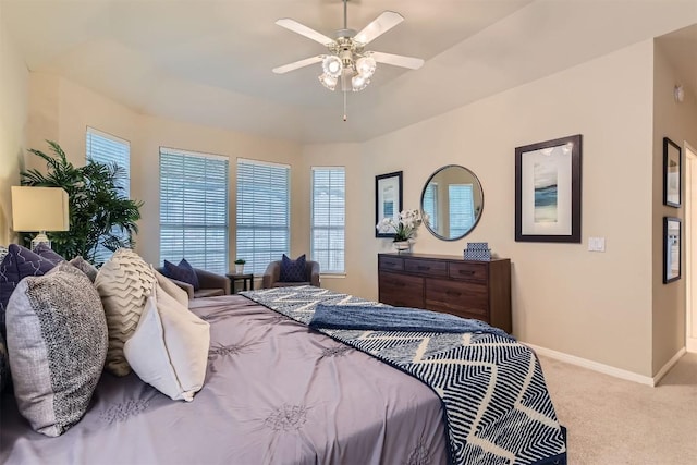 bedroom with carpet flooring, baseboards, and ceiling fan