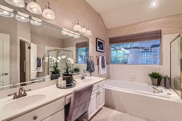 bathroom with tile patterned floors, a sink, a shower stall, and a bath