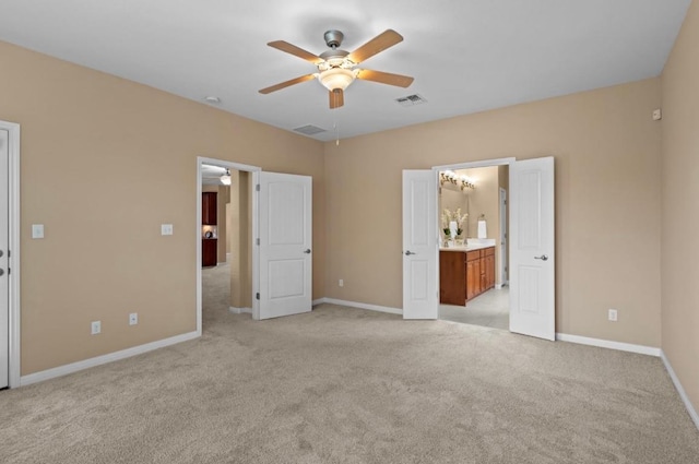 17920 Silent Harbor Loop, Pflugerville, TX 78660 - unfurnished bedroom featuring light carpet, baseboards, and ceiling fan