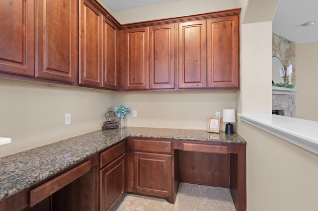 17920 Silent Harbor Loop, Pflugerville, TX 78660 - unfurnished office featuring built in desk and a stone fireplace