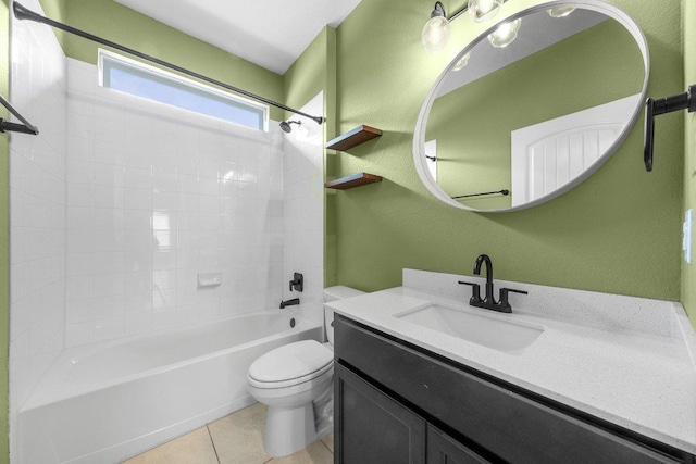 full bathroom with tile patterned flooring, vanity, toilet, a textured wall, and shower / washtub combination