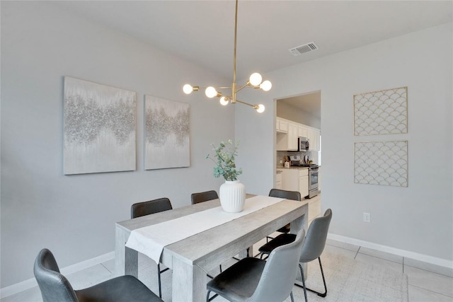 6608 May Shower Dr, Austin, TX 78744 - dining space with a chandelier and light tile patterned floors