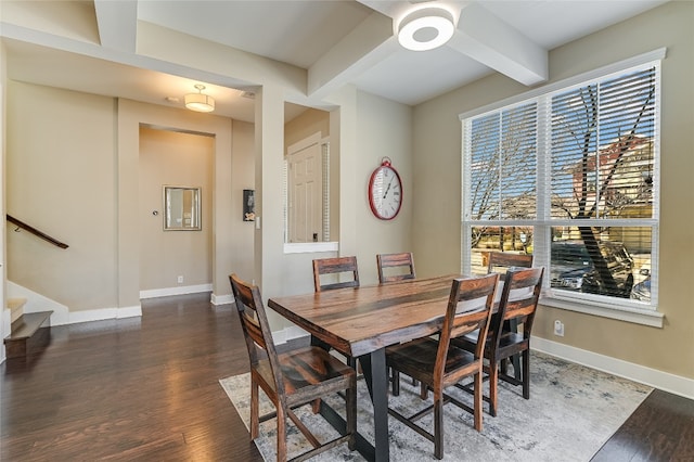 928 Sugaree Ave, Austin, TX 78757 - dining area featuring wood finished floors, beamed ceiling, baseboards, and stairs