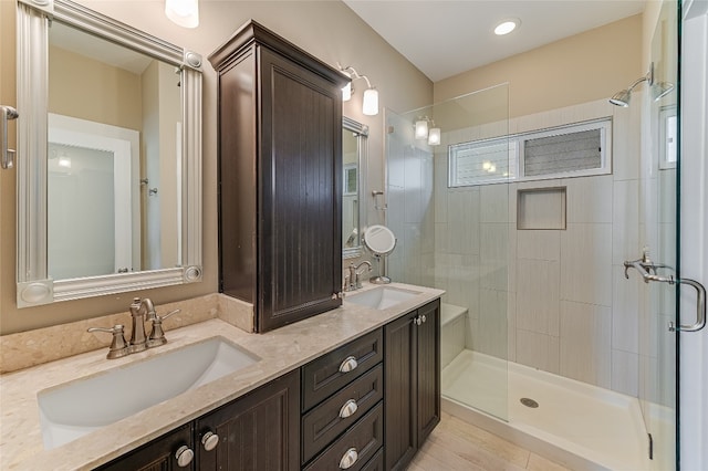 928 Sugaree Ave, Austin, TX 78757 - full bathroom featuring tiled shower and double vanity