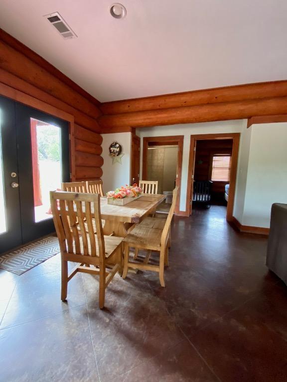 2550 Fm 2342 Hero'S Hideaway, Unit Heros Hideaway, Burnet, TX 78611 - dining room with log walls and french doors