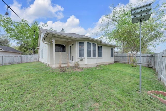 1708 Royal Ascot Dr, Pflugerville, TX 78660 - rear view of property featuring a fenced backyard, a yard, and a chimney