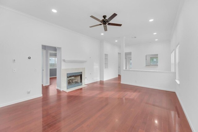 1708 Royal Ascot Dr, Pflugerville, TX 78660 - unfurnished living room featuring wood finished floors, recessed lighting, ornamental molding, and ceiling fan