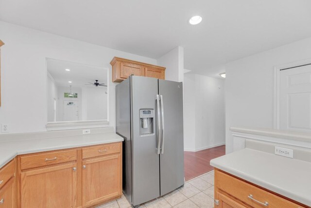 1708 Royal Ascot Dr, Pflugerville, TX 78660 - kitchen featuring light tile patterned flooring, light countertops, recessed lighting, a ceiling fan, and stainless steel refrigerator with ice dispenser