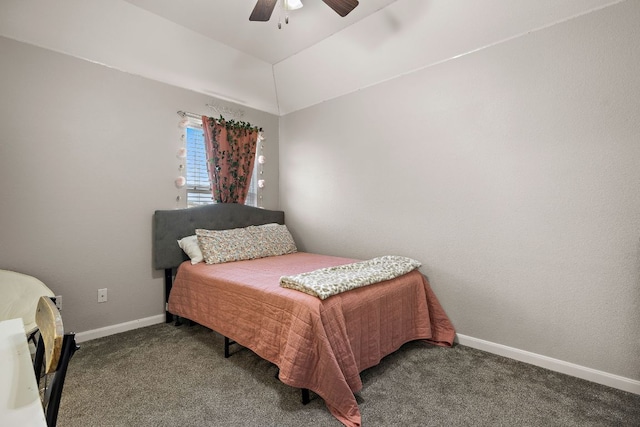 bedroom with a ceiling fan, carpet, baseboards, and vaulted ceiling