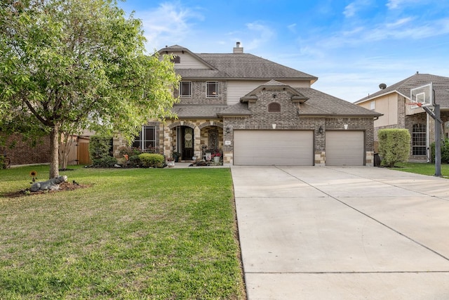 view of front of property with roof with shingles, concrete driveway, a chimney, an attached garage, and a front lawn