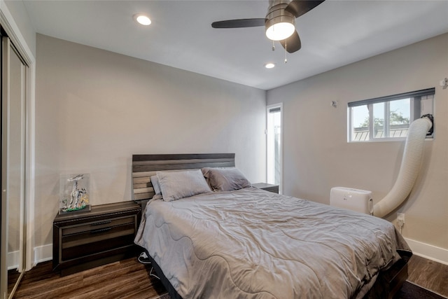 bedroom featuring a closet, baseboards, ceiling fan, wood finished floors, and recessed lighting