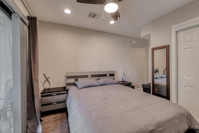 935 La Posada Dr Unit 217, Austin, TX 78752 - bedroom featuring wood finished floors, ceiling fan, and recessed lighting