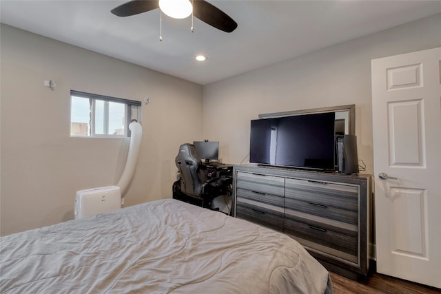 bedroom featuring recessed lighting, ceiling fan, and wood finished floors