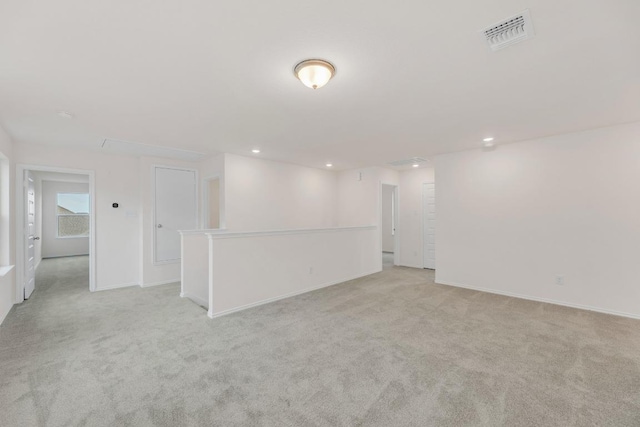 4915 Mozzafiato Ln, Round Rock, TX 78665 - unfurnished room featuring light carpet, attic access, and recessed lighting