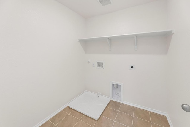 4915 Mozzafiato Ln, Round Rock, TX 78665 - washroom featuring hookup for a gas dryer, washer hookup, hookup for an electric dryer, and tile patterned floors