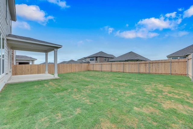 4915 Mozzafiato Ln, Round Rock, TX 78665 - fenced backyard with a patio area