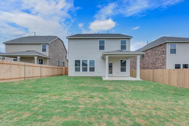 4915 Mozzafiato Ln, Round Rock, TX 78665 - rear view of property with a patio and a fenced backyard