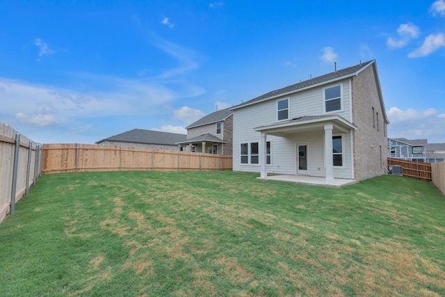 4915 Mozzafiato Ln, Round Rock, TX 78665 - rear view of property featuring a patio, a fenced backyard, and brick siding
