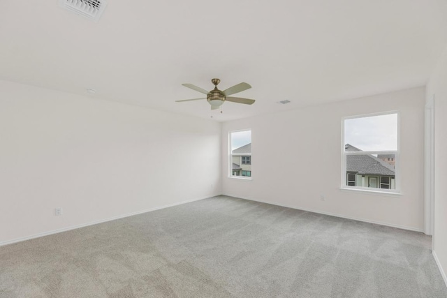 4915 Mozzafiato Ln, Round Rock, TX 78665 - spare room with light carpet and ceiling fan
