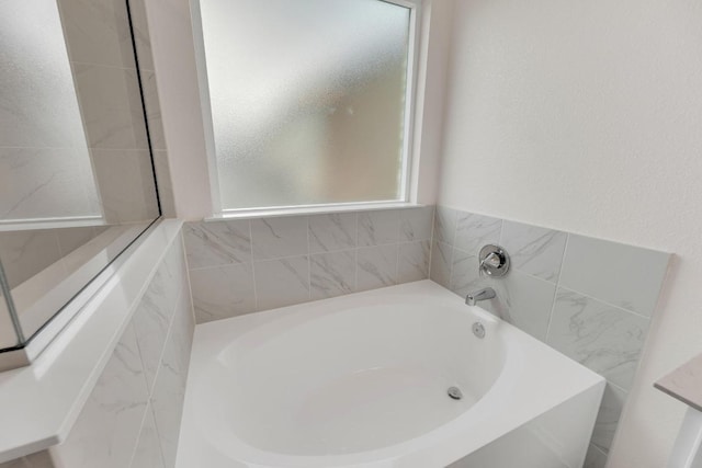 4915 Mozzafiato Ln, Round Rock, TX 78665 - full bathroom with a bath and plenty of natural light