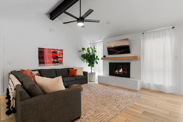 10100 Dobbin Dr, Austin, TX 78748 - living area featuring ceiling fan, wood finished floors, and a fireplace