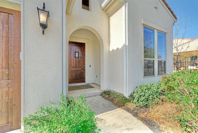 12113 Beautybrush Dr, Austin, TX 78738 - view of exterior entry featuring stucco siding