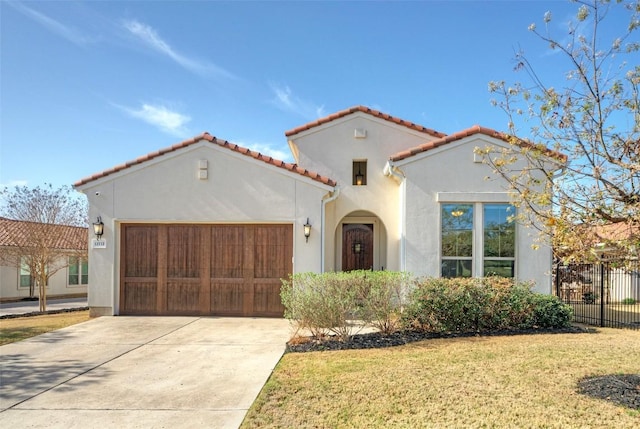 12113 Beautybrush Dr, Austin, TX 78738 - mediterranean / spanish house with stucco siding, an attached garage, driveway, and a tiled roof