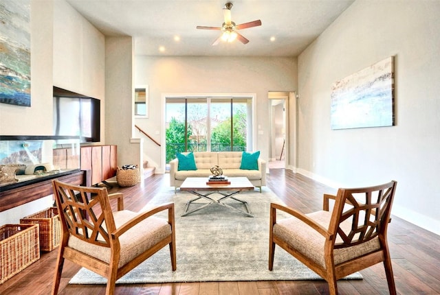 12113 Beautybrush Dr, Austin, TX 78738 - living room with stairway, wood finished floors, and ceiling fan