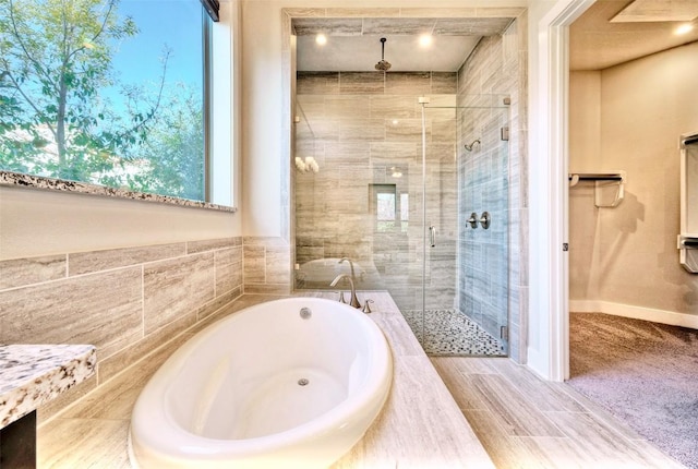 12113 Beautybrush Dr, Austin, TX 78738 - full bathroom with a shower stall and a garden tub
