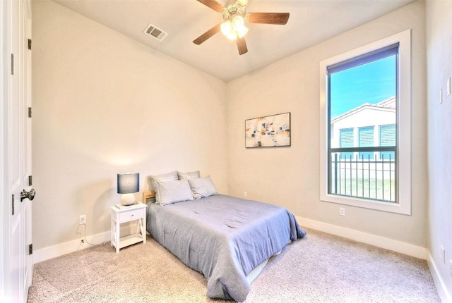 12113 Beautybrush Dr, Austin, TX 78738 - carpeted bedroom featuring baseboards and a ceiling fan
